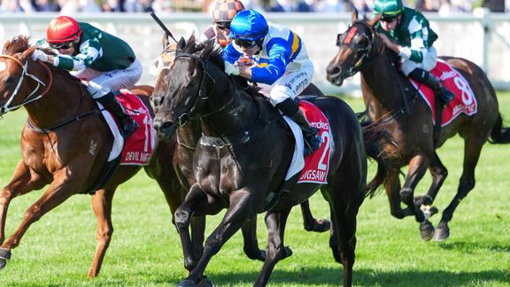Jigsaw, ridden by Logan Bates (blue cap, sleeves), wins the Group 1 William Reid Stakes at Caulfield last month. Picture: Scott Barbour / Racing Photos